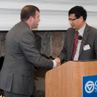 winner shaking hands